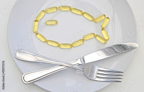 Fish Shape Cod Liver Oil Tablets on Plate