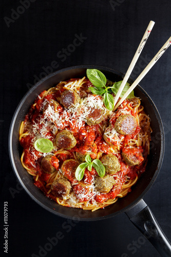 spaghetti and vegetarian meatballs from lentils , potato and che