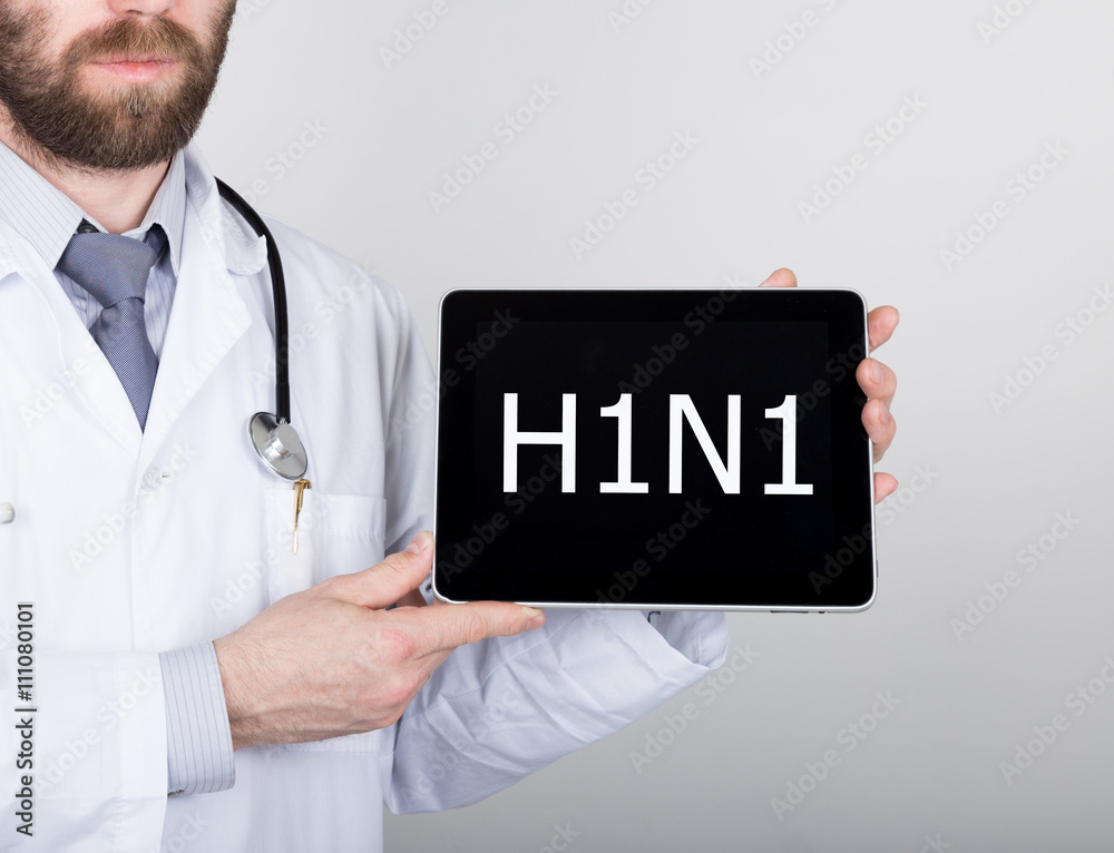 technology, internet and networking in medicine concept - Doctor holding a tablet pc with h1n1 sign. Internet technologies in medicine technology, internet and networking in medicine concept - Doctor holding a tablet pc with h1n1 sign. Internet technologies in medicine