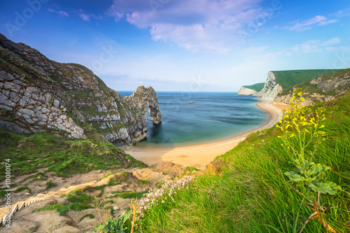 Φωτογραφία Durdle Door at the beach on the Jurassic Coast of Dorset, UK