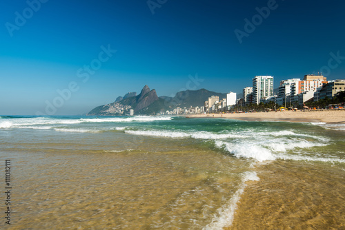 Low Waves on the Sand of Ipanema Beach in Rio de Janeiro © Donatas Dabravolskas