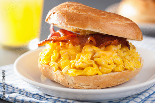 breakfast sandwich on bagel with egg bacon cheese