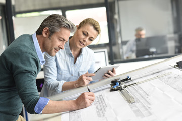 Team of architects working together on project