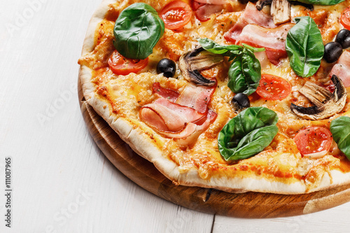 CLOSEUP view VERY HOT Italian Pizza. Prosciutto, Capricciosa, Funghi, Cotto HOMEMADE PIZZA. PIZZA ITALIAN, HOMEMADE PIZZA, PIZZA, PIZZA, PIZZA, PIZZA, PIZZA, PIZZA, PIZZA, PIZZA, PIZZA 