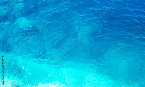 Soft blurred texture of blue water © modusviv
