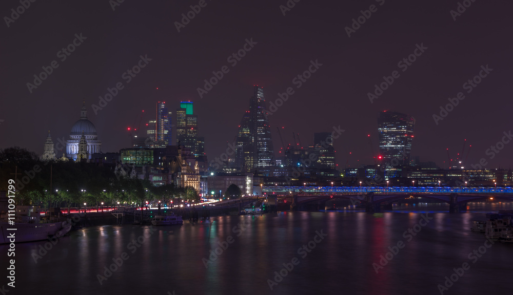 London cityscape at night including St, Paul’s Cathedral and Blackfriars Bridge