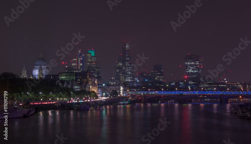 London cityscape at night including St  Paul   s Cathedral and Blackfriars Bridge