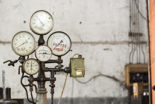 Old rusty industrial gauges