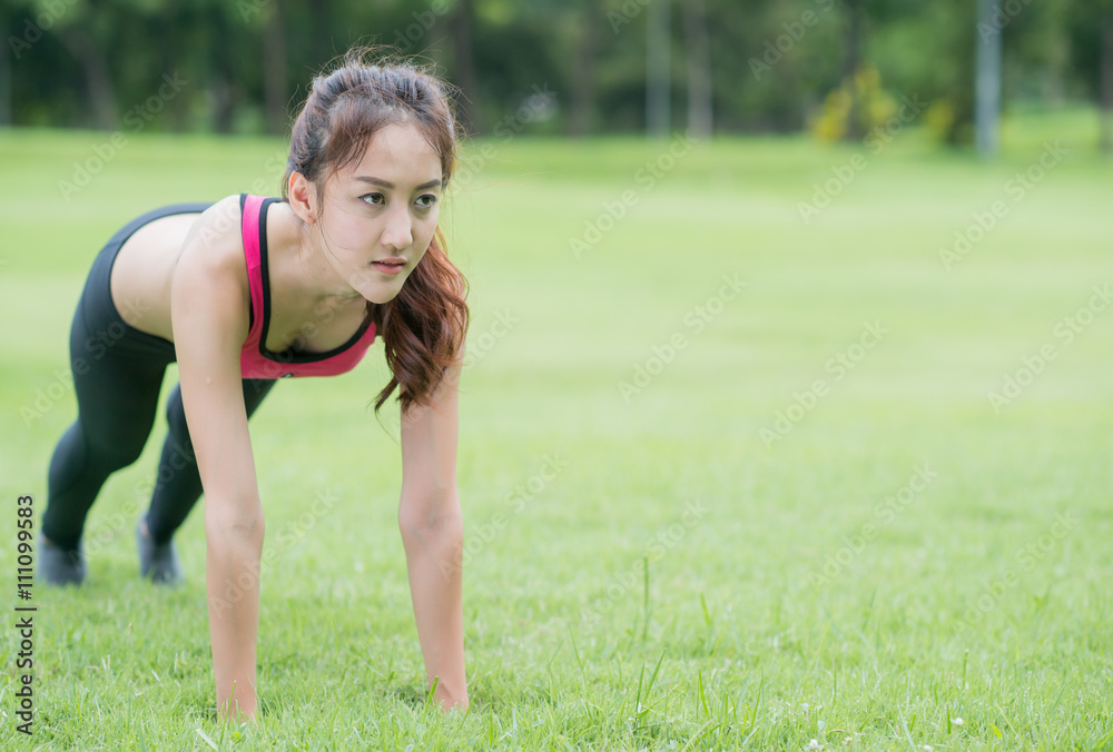 beautiful asian woman exercising in the park beautiful asian woman exercising in the park