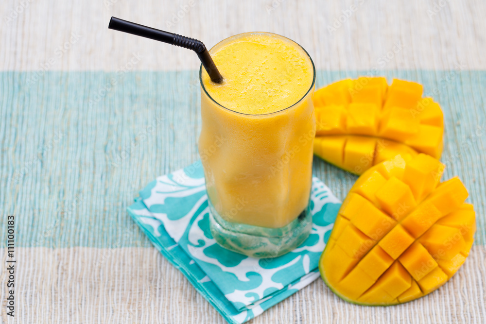 Fotografie Fresh tropical fruit smoothie mango juice