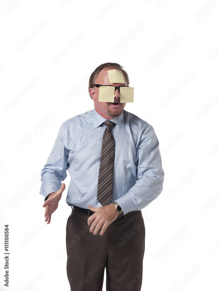 businessman with sticky paper on face. businessman with sticky paper on face.