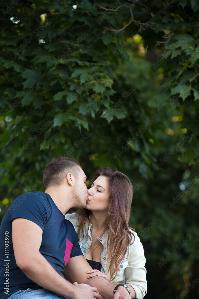 Couple kissing outside