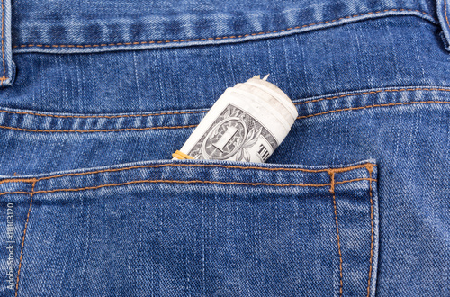 dollar in jean pocket photo