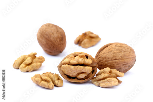 Pile of walnuts isolated on white background