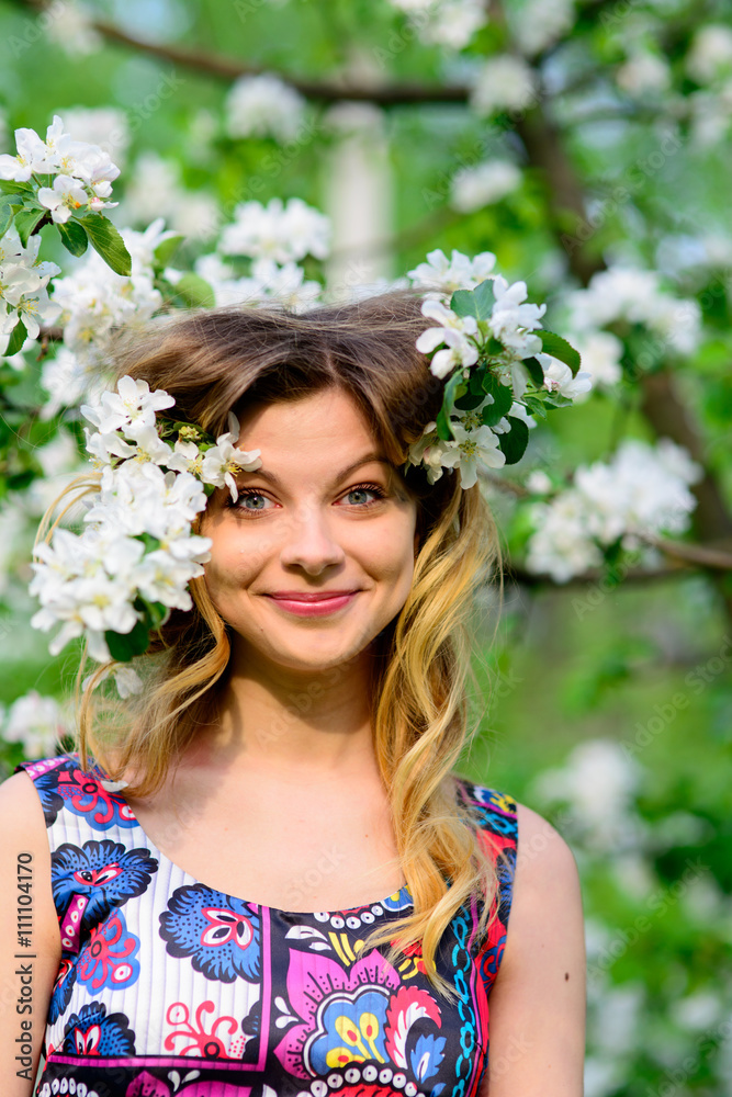 Beautiful woman in blooming garden Beautiful woman in blooming garden