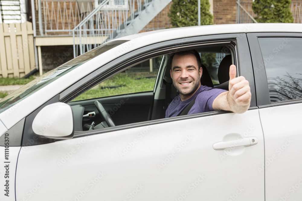 Young owner man with his car