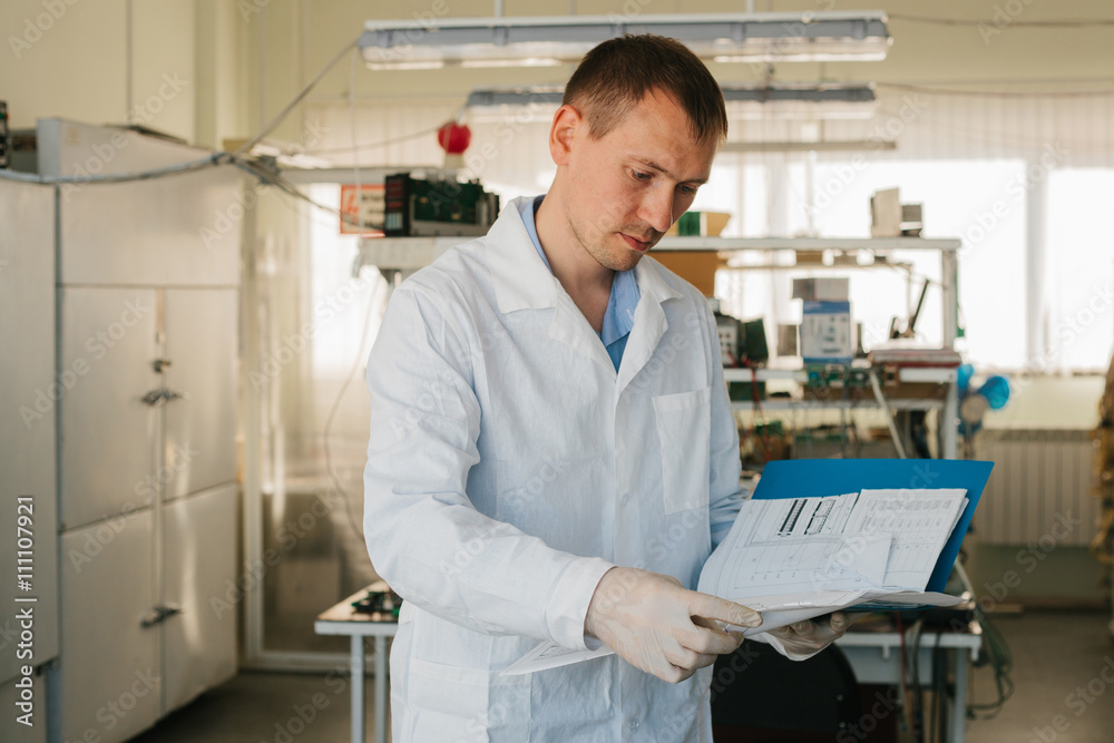 Microchip production factory. Computer expert
