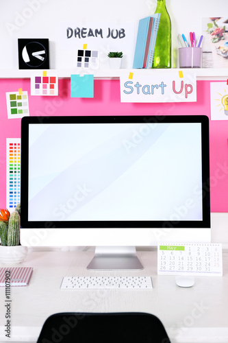 Stylish workplace with comp...