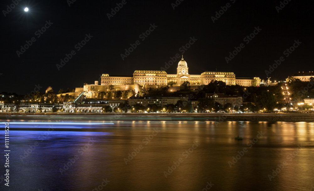 Buda Castle by Danube river at night. Budapest, Hungary.