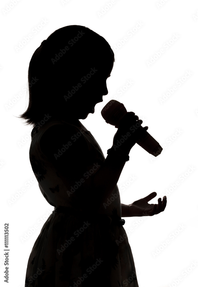 Singing young girl with microphone on white background Singing young girl with microphone on white background