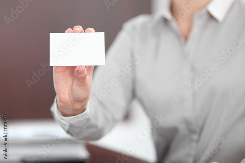 Business woman giving visit card