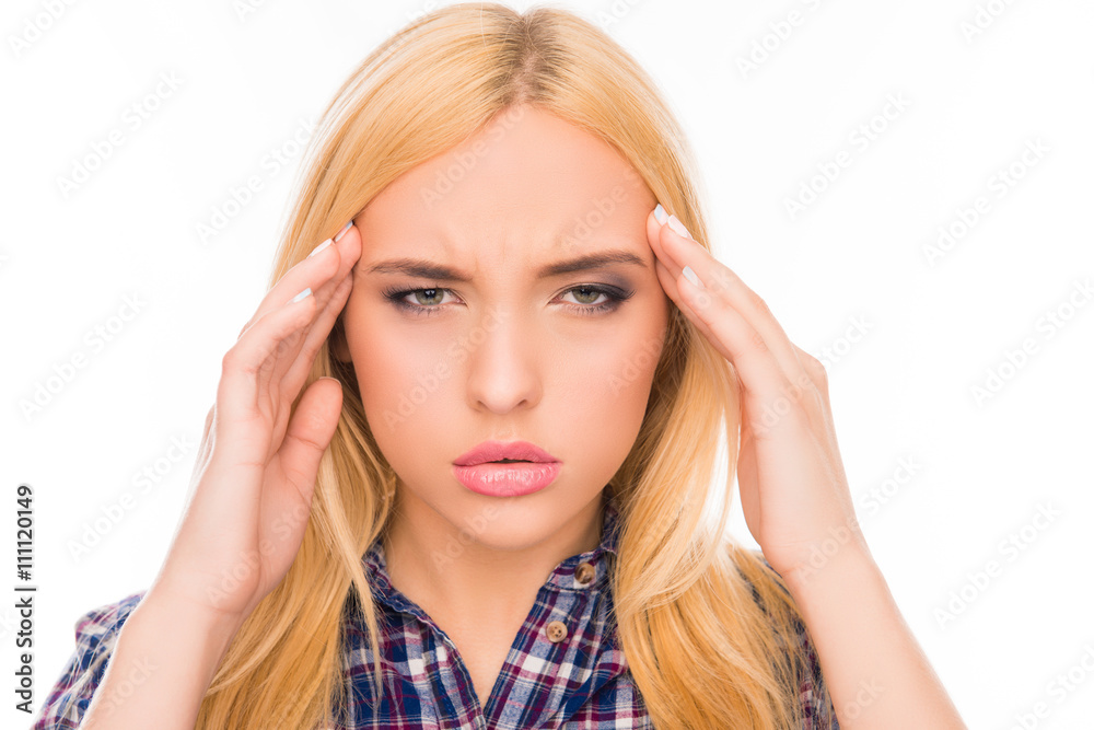 Portrait of overworked tired woman with strong headache Portrait of overworked tired woman with strong headache