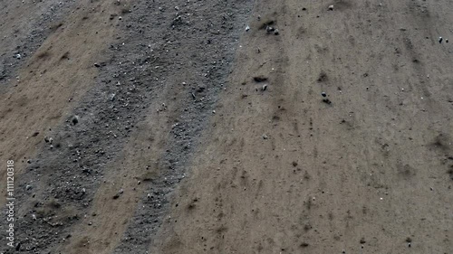 Rocks and boulders sliding down hillside. photo