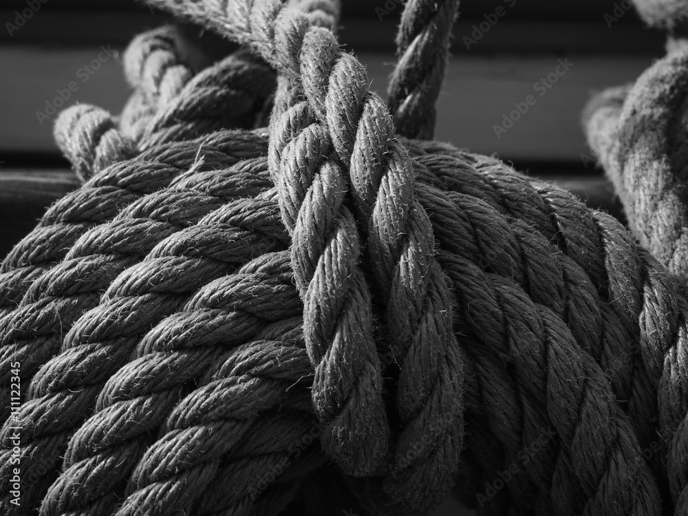 black and white of coil of line on a traditional tallship or sailing ship