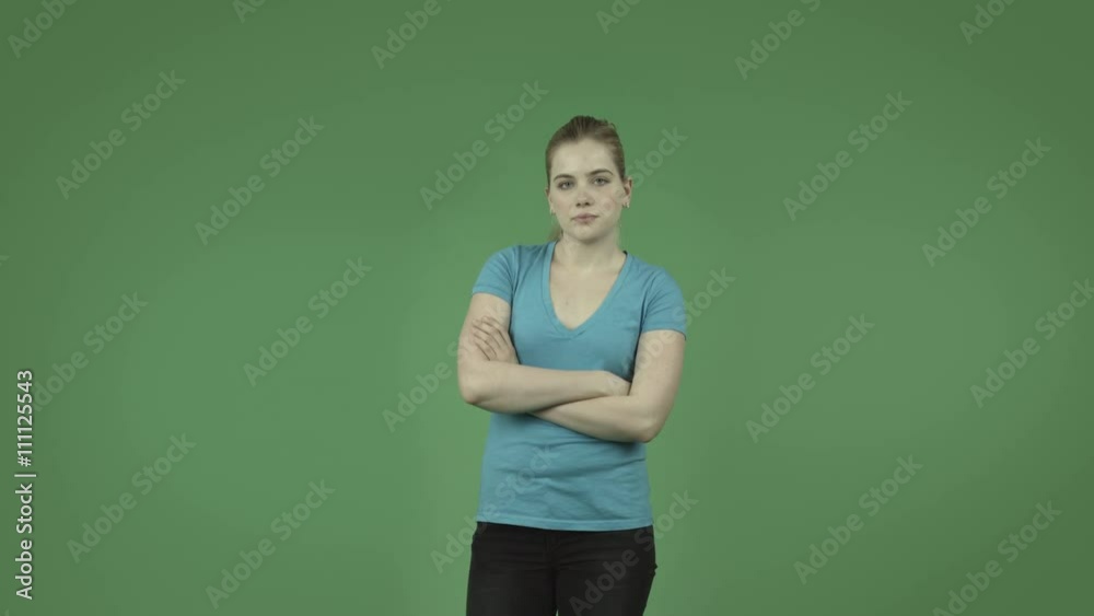 attractive upset caucasian casual girl isolated on green attractive upset caucasian casual girl isolated on green
