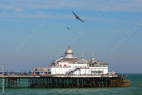 Avro Lancaster and Spitfire MK1 flying over Eastbourne Pier photo