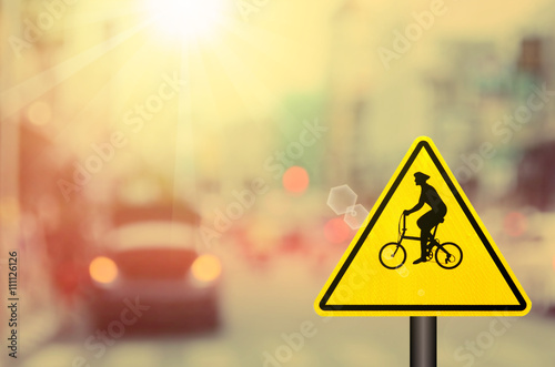 Traffic sign,bicycle sign on blur traffic road