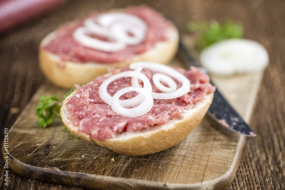 Bun with Mett (German cuisine; selective focus)