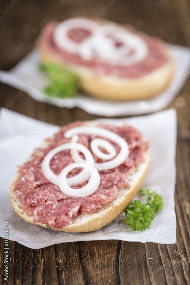 German Cuisine (bun with Mett; selective focus)