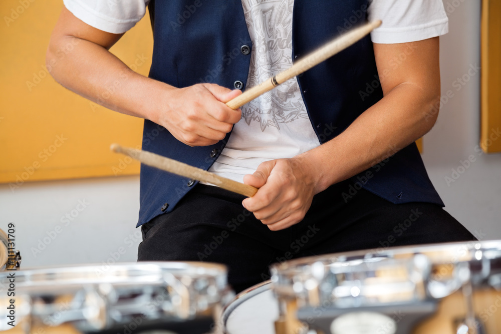 Obraz premium Drummer Performing In Recording Studio