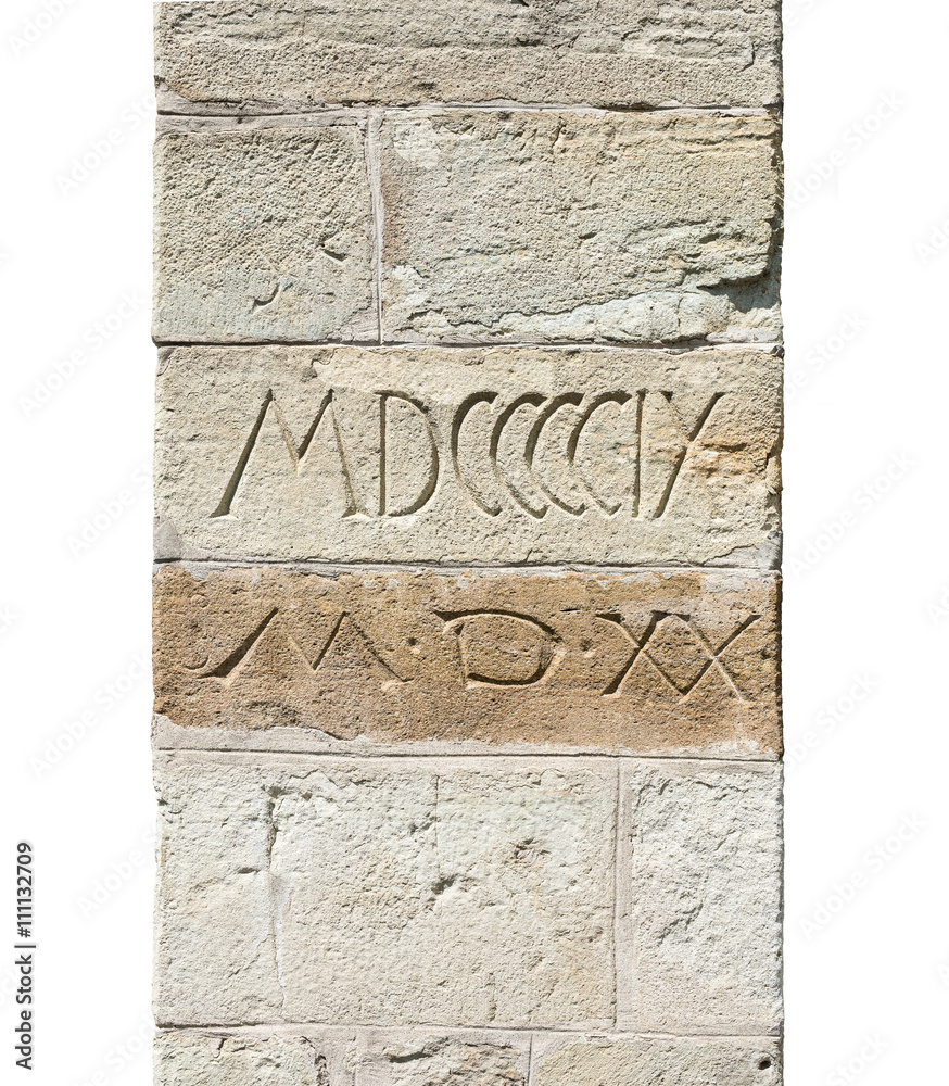 Stone wall textures. Medieval buttress detail with Roman numerals.