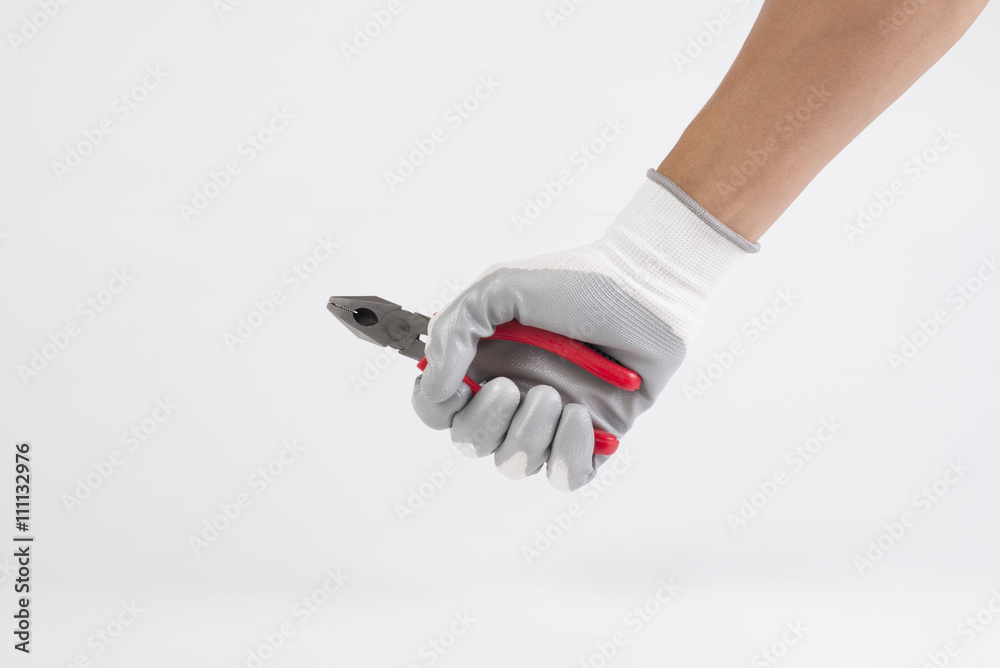 hand wear a glove holding pliers isolated on white background.