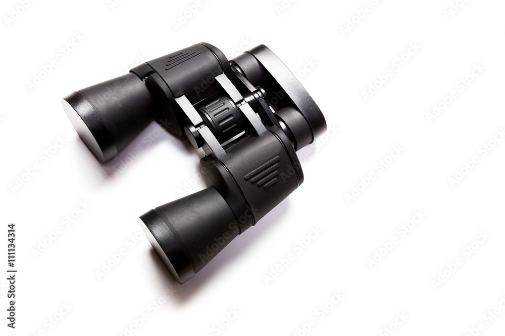 Black binoculars isolated over white background Black binoculars isolated over white background