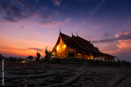 Temple Sirindhorn Wararam Phuproud in Ubon Ratchathani Province at twilight time,Thailand.The public temple of buddhism. photo