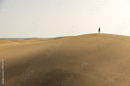 Men walking in the desert of gran canaria  spain