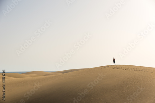 Men walking in the desert of gran canaria  spain