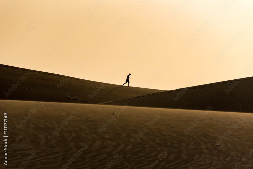 Men walking in the desert of gran canaria, spain