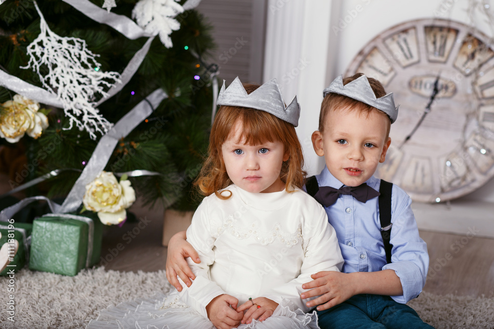 Two elegant little kids in crown. Two elegant little kids in crown.