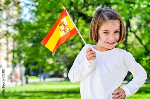 Cheerful Young Girl With Spanish Flag
