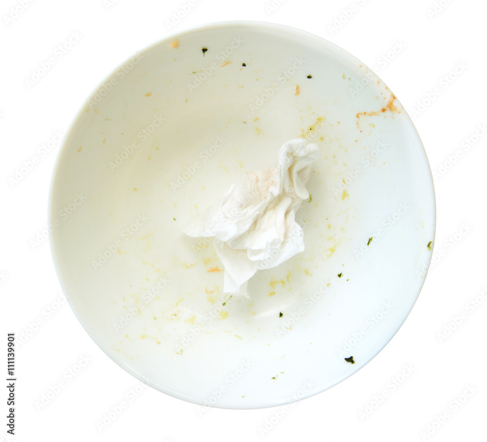 leavings on a white dish, isolate on white. leavings on a white dish, isolate on white.