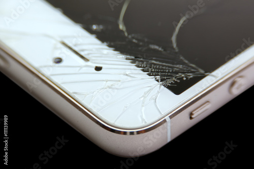 Close up mobile smartphone with broken screen