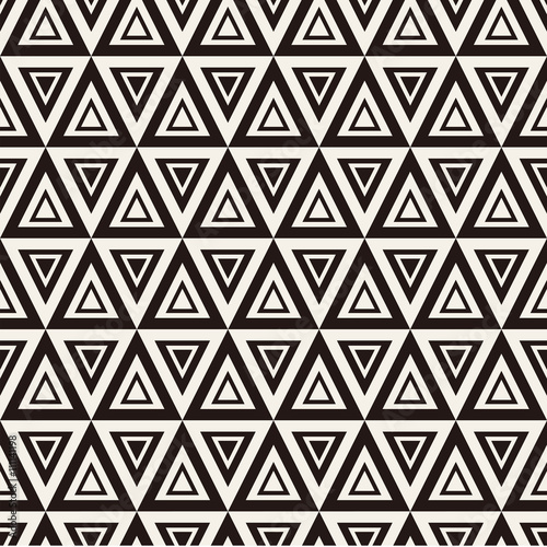 Vector seamless pattern. Modern stylish texture. Repeating geometric tiles with striped triangles. Hipster monochrome print. Trendy graphic 