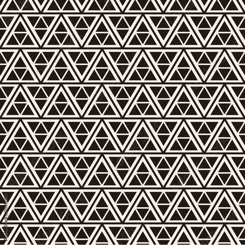 Vector seamless pattern. Modern stylish texture. Repeating geometric tiles with striped triangles. Hipster monochrome print. Trendy graphic 