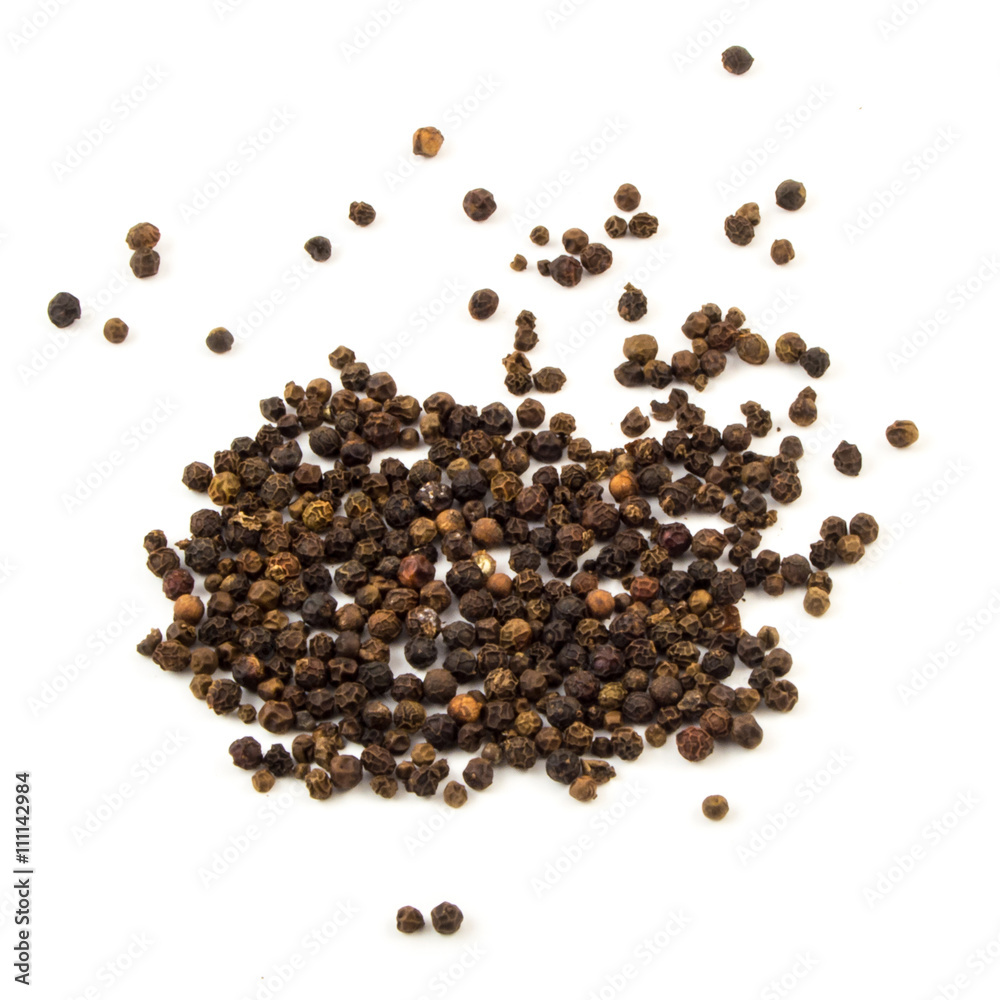 Black pepper was placed on a white background Black pepper was placed on a white background