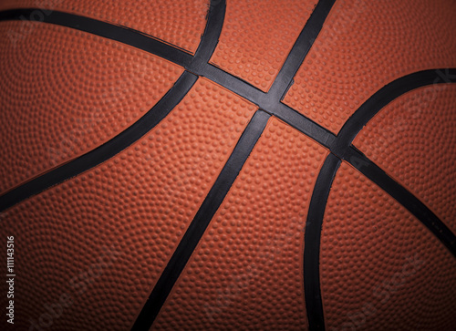 Closeup of a basketball ball background © cristovao31