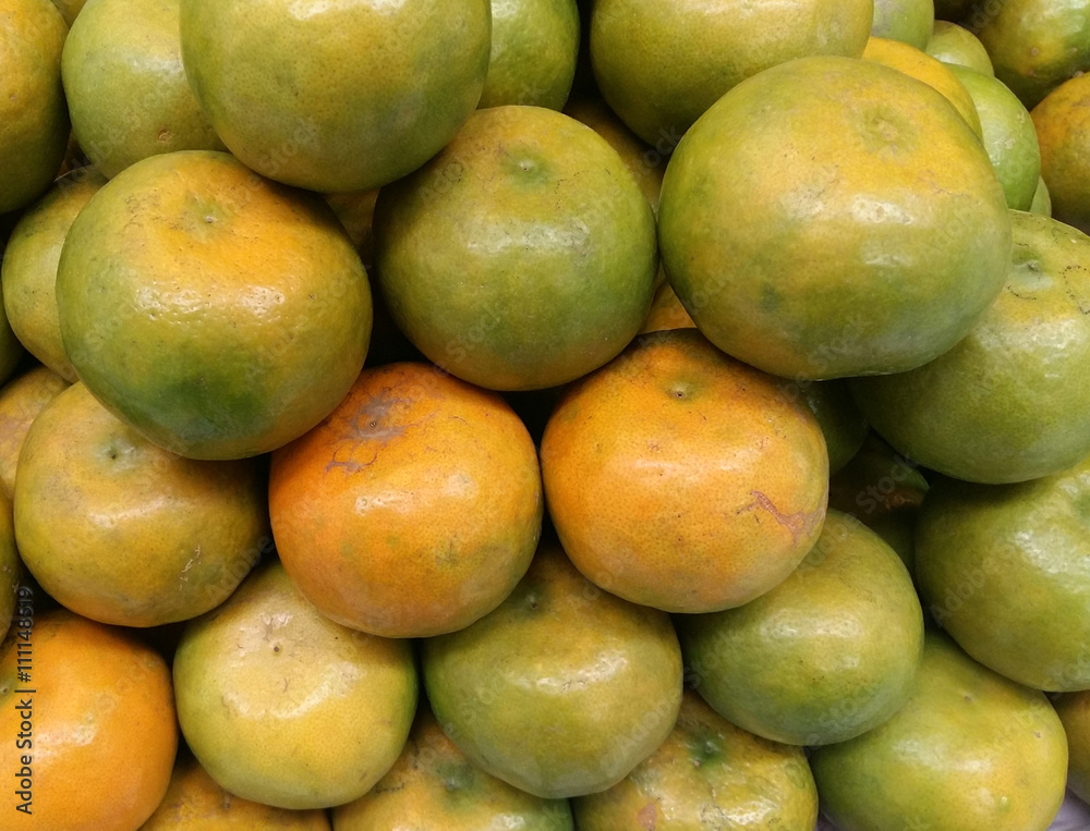 Orange fruit for sale at market stall
